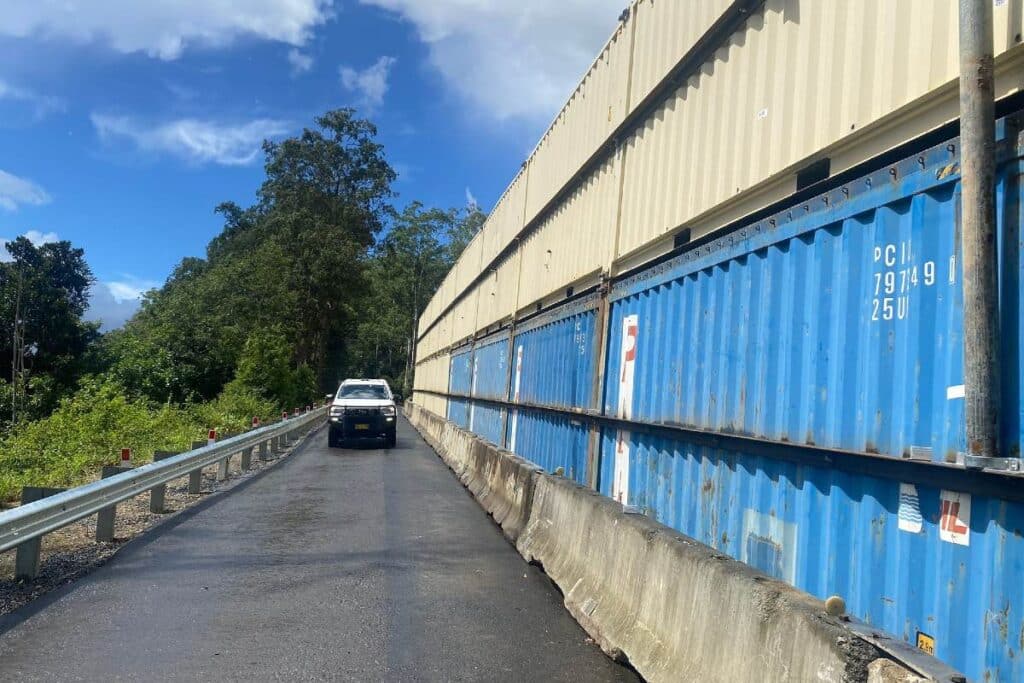 Shipping container barrier restores vital regional freight route