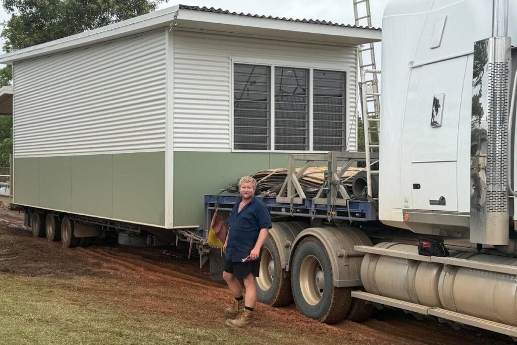 Young gun truckie hauling the big loads with his Western Star